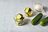 cucumber slices on a neutral background