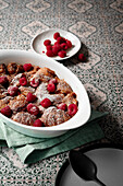 Caramel croissant pudding with fresh raspberries