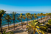 The Paseo Maritimo De Marbella promenade on Playa de la Fontanilla beach, Marbella, Costa del Sol, Andalusia, Spain, Europe