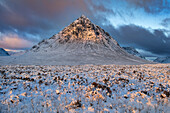 Stob Dearg (Buachaille Etive Mor) at the entrance to Glen Coe in winter at sunrise, Rannoch Moor, Argyll and Bute, Scottish Highlands, Scotland, United Kingdom, Europe