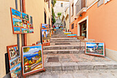 Old town street filled with artwork and paintings, Taormina, Sicily, Italy, Mediterranean, Europe