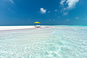 Two chairs and umbrella on stunning tropical beach,  The Maldives, Indian Ocean, Asia