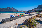 View of people bathing on Hout Bay Beach, Hout Bay, Cape Town, Western Cape, South Africa, Africa