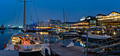 View of boats and restaurants in the Waterfront at dusk, Cape Town, Western Cape, South Africa, Africa