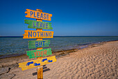 View of  sign reading Please Leave Nothing But Your Footprints on the Beach, Sahl Hasheesh, Hurghada, Red Sea Governorate, Egypt, North Africa, Africa