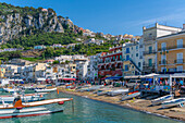 View of boats in Marina Grande overlooked by Capri Town in the background, Isle of Capri, Bay of Naples, Campania, Italy, Mediterranean, Europe