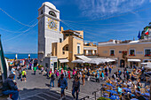 View of Clock Tower and cafes in Piazza Umberto I (La Piazzetta), Capri Town, Isle of Capri, Bay of Naples, Campania, Italy, Mediterranean, Europe