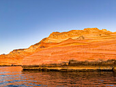 Sandstone cliff formations at sunrise on Isla San Jose, Baja California Sur, Sea of Cortez, Mexico, North America