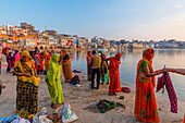 Pilgrims at Pushkar Lake at sunrise, Pushkar, Rajasthan, India, South Asia, Asia