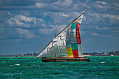 Traditional Dhow sailing off the coast of the Island of Mozambique, Mozambique, Africa