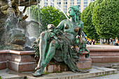 Sculpture of woman at Neptune Fountain designed by Reinhold Begas, Mitte, Berlin, Germany, Europe