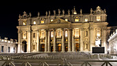 Night view of Saint Peter's Basilica, silhouetted against darkened sky, Vatican City, the papal enclave in Rome, UNESCO World Heritage Site, Rome, Lazio, Italy, Europe