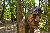 Outdoor wooden sculpture gallery on the Hill of Witches, near Juodkrante, Curonian Spit, Lithuania, Baltic States, North Europe