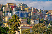 View of pastel coloured villas near Sant'Elmo Castle from Rotonda Diaz, Naples, Campania, Italy, Europe