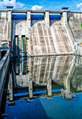 High-resolution panorama of the Puente Nuevo Dam in Villaviciosa de Córdoba, Andalusia, Spain. Captures the impressive structure of the dam and the clear reflection in the water.