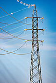 High voltage power lines from a solar thermal plant cross agricultural lands in Sanlúcar la Mayor, Sevilla, Andalucía, España.