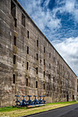 Exterior view of the German submarine base from World War II located in Lorient, Brittany, France, showcasing its historic architecture.