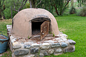 A traditional outdoor oven on the grounds of the Hosteria Automovil Club Argentino in Cachi, Argentina.