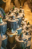 View of a traditional winery in Villaviciosa de Córdoba, Andalusia, Spain. Featuring wine barrels and vintage equipment.