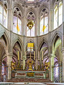 The ornate altar inside the Men's Abbey, church of Saint Etienne, located in Caen, Normandy, France. Beautiful Gothic architecture and religious art.