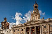 A beautiful view of the Ayuntamiento de Cadiz in Andalusia, Spain with its stunning architecture and clear blue sky.