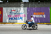 Billboards and murals in the streets of Caracas, campaigning for President Nicolas Maduro's election in Venezuela