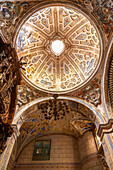 Stunning view of the ornate dome interior at Iglesia de la O, located in Sanlucar de Barrameda, Cadiz, Andalusia, Spain.