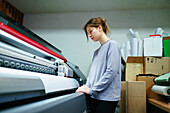 Woman working in printing studio