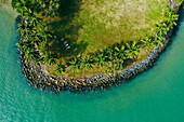 Drone view of tropical island and turquoise sea