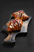 Raspberry croissants with sugar glaze