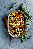 Oven vegetables with pumpkin seeds, thyme and goat's cheese