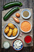 Ingredients for vegetarian moussaka with lentils, potatoes and zucchinis