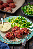 Bulgur cakes with beet and feta