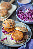 Bean and carrot burger with red cabbage salad