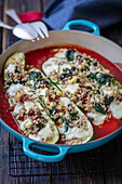 Zucchinis stuffed with barley, spinach and mozzarella