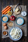 Ingredients for curd cheese dumplings (Leniwe) with carrot and apple salad