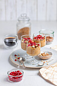 Mascarpone coffee cream with nuts and pomegranate seeds