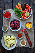 Ingredients for Mexican soup with chorizo and avocado