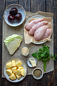 Ingredients for chicken breast with beet puree, potatoes and braised cabbage