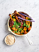 Slow-cooked lamb shank curry with potatoes and cauliflower