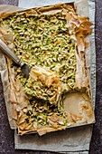 Filo pastry tart with zucchini, rice and pine nuts