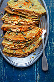 Wholemeal spinach crepes with lentil cream and pumpkin seeds