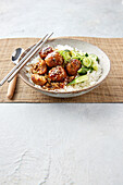 Korean honey meatballs with rice and cucumber