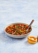 Soup with lamb and vegetables served with Yorkshire puddings