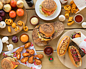 Various burgers, hot dogs, chicken wings and twister fries