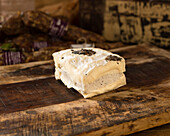 Truffle brie on a wooden board