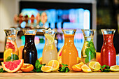 Various homemade lemonades in carafes