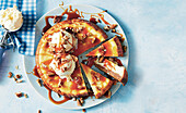 Pecan Pie Cheesecake with Sticky Rum Sauce