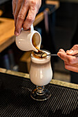 Preparing Irish coffee