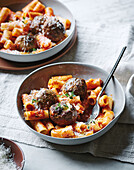 Rigatoni with cheese and pesto-filled meatballs